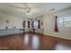 Bonus room with wood floors, and custom built ins, perfect for entertaining at 18581 E Aubrey Glen Rd, Queen Creek, AZ 85142