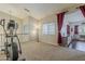 Loft space with wood floors and carpet with a view into the home theater at 18581 E Aubrey Glen Rd, Queen Creek, AZ 85142