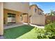 Backyard features synthetic grass and a storage shed at 19172 E Kingbird Dr, Queen Creek, AZ 85142
