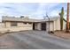 Attractive single-story home featuring a well-kept yard and a spacious driveway at 2001 W Surrey Ave, Phoenix, AZ 85029