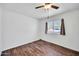 Well-lit bedroom features hardwood floors, a ceiling fan and a window at 2024 N 200Th Ave, Buckeye, AZ 85396