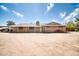 Single-story brick home with a driveway and desert landscaping at 2024 N 200Th Ave, Buckeye, AZ 85396