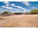 Extensive property with storage buildings, ample parking, and potential for various uses at 2024 N 200Th Ave, Buckeye, AZ 85396