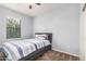 Bedroom featuring carpeted floor, neutral paint and window for natural light at 20261 W Desert Bloom St, Buckeye, AZ 85326