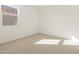 Bright bedroom with a window providing natural light at 20368 N 224Th Dr, Surprise, AZ 85387