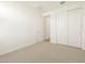 Comfortable bedroom with sliding closet doors and open doorway at 20368 N 224Th Dr, Surprise, AZ 85387