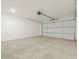 A spacious two car garage with finished walls and sealed concrete floor at 20368 N 224Th Dr, Surprise, AZ 85387