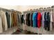 Walk-in closet with ample storage space and organized clothing racks at 21690 N Lynn St, Maricopa, AZ 85138