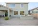 A large backyard boasts a built-in outdoor kitchen and ample brick-paved patio space, ideal for barbecues and outdoor enjoyment at 2211 W Desert Ln, Phoenix, AZ 85041
