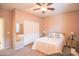 Comfortable bedroom featuring light walls and a closet with sliding white doors at 2211 W Desert Ln, Phoenix, AZ 85041
