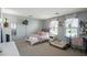 Cozy bedroom with stylish decor, natural light, and soft, neutral colors at 2211 W Desert Ln, Phoenix, AZ 85041