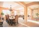 Elegant dining room with a decorative chandelier and spacious layout at 2211 W Desert Ln, Phoenix, AZ 85041