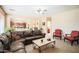 Spacious living room with plush furniture and natural light at 2211 W Desert Ln, Phoenix, AZ 85041