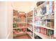 Pantry with lots of shelves for optimal food and supply storage at 2211 W Desert Ln, Phoenix, AZ 85041