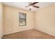 Bedroom with natural light, carpet, a ceiling fan, and ample space at 22123 E Vía Del Palo --, Queen Creek, AZ 85142