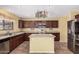 Modern kitchen featuring stainless steel appliances, ample counter space, and stylish cabinetry at 22123 E Vía Del Palo --, Queen Creek, AZ 85142