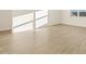 View of light wood-look ceramic tile floors in a sunlit room, showcasing natural wood tones at 22490 W Tonopah Dr, Surprise, AZ 85387