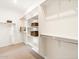 Large walk-in closet features shelving, hanging racks, and ample storage space at 22490 W Tonopah Dr, Surprise, AZ 85387