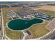 Community recreation including a central lake with fountain, baseball, tennis and water park at 22609 E Roundup Way, Queen Creek, AZ 85142