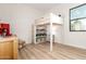 bedroom featuring a loft bed and built in storage at 22609 E Roundup Way, Queen Creek, AZ 85142