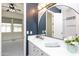 Bathroom featuring vanity with round mirror at 2310 W Sienna Bouquet Pl, Phoenix, AZ 85085