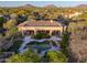 Aerial view of backyard with pool, patio, and lush desert landscape in a beautiful community at 24158 N 78Th Pl, Scottsdale, AZ 85255