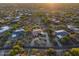 Serene aerial perspective of homes within a desert community, blending seamlessly with the natural landscape at 24158 N 78Th Pl, Scottsdale, AZ 85255