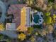 Aerial view of a desert home with a tile roof, an expansive pool with a spa, and lush desert landscaping at 24158 N 78Th Pl, Scottsdale, AZ 85255