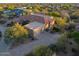 Beautiful home featuring a tile roof, desert landscaping, and an extended driveway to a two-car garage at 24158 N 78Th Pl, Scottsdale, AZ 85255