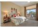 Serene main bedroom with private patio access and plenty of natural light at 24158 N 78Th Pl, Scottsdale, AZ 85255