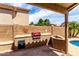 Backyard patio with built-in BBQ area, perfect for entertaining, with a view of the yard at 2503 E Camellia Dr, Gilbert, AZ 85296