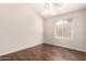 Bright bedroom with wood floors, natural light, and a neutral color palette at 2503 E Camellia Dr, Gilbert, AZ 85296