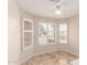 Cozy dining area with plantation shutters, tile floors, and natural light at 2503 E Camellia Dr, Gilbert, AZ 85296