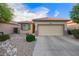 Charming single-story home with desert landscaping and a two-car garage at 2734 W Bowker St, Phoenix, AZ 85041