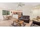 Open-concept living area with a dining table, kitchen view, and comfortable seating at 2734 W Bowker St, Phoenix, AZ 85041