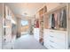 Bright bedroom with bunk beds, large closet, and sliding glass doors to a private balcony at 29966 N 72Nd Dr, Peoria, AZ 85383