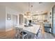 Eat-in kitchen features stainless steel appliances, an island, and white countertops at 29966 N 72Nd Dr, Peoria, AZ 85383