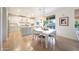 Bright eat-in kitchen featuring an island, stainless appliances, and a view to the back yard at 29966 N 72Nd Dr, Peoria, AZ 85383
