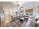 Inviting open-concept living space with kitchen, dining, and living areas flowing seamlessly together at 29966 N 72Nd Dr, Peoria, AZ 85383