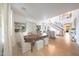 Open-concept living room with hardwood floors, built-in shelving, and plenty of natural light at 29966 N 72Nd Dr, Peoria, AZ 85383