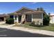 Charming single-story home featuring a well-manicured lawn and beautiful landscape at 314 E Campo Bello Dr, Phoenix, AZ 85022
