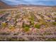 Thriving residential area featuring desert landscaping, modern homes, and majestic mountain views at 31900 N 127Th Ln, Peoria, AZ 85383