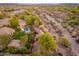 This elevated view highlights the desert scenery, pool, and landscaped backyard oasis at 31900 N 127Th Ln, Peoria, AZ 85383