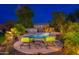 Backyard pool and landscaping offers a relaxing outdoor space for recreation at 31900 N 127Th Ln, Peoria, AZ 85383