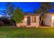 Charming casita showcasing manicured lawn and desert landscaping at 31900 N 127Th Ln, Peoria, AZ 85383