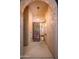 Welcoming entryway featuring decorative tile, and a secure decorative metal screen door at 31900 N 127Th Ln, Peoria, AZ 85383