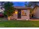 A charming front entrance with manicured lawn and cozy feel at 31900 N 127Th Ln, Peoria, AZ 85383