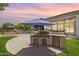 Built in barbecue and food prep area overlooking the stunning backyard, pool, waterfalls and desert landscaping at 3410 E Inglewood Cir, Mesa, AZ 85213