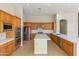 Well-equipped kitchen with stainless appliances, island and spacious countertops at 3410 E Inglewood Cir, Mesa, AZ 85213
