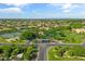 Aerial view of a charming neighborhood showcasing lush landscaping and community amenities at 3410 E Inglewood Cir, Mesa, AZ 85213
